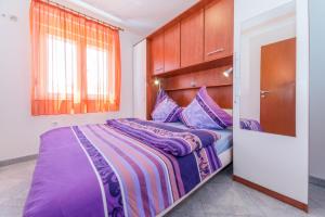 Postel nebo postele na pokoji v ubytování Apartments Hudic