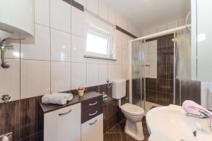 Koupelna v ubytování Apartments Hudic