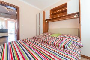 Postel nebo postele na pokoji v ubytování Apartments Hudic
