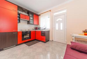 Kuchyň nebo kuchyňský kout v ubytování Apartments Hudic