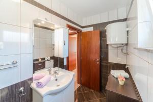 Koupelna v ubytování Apartments Hudic
