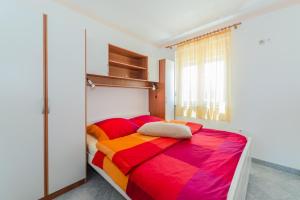 Postel nebo postele na pokoji v ubytování Apartments Hudic