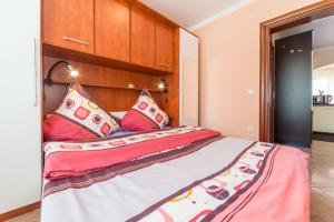 Postel nebo postele na pokoji v ubytování Apartments Hudic