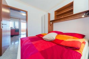 Postel nebo postele na pokoji v ubytování Apartments Hudic