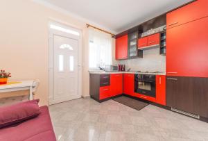 Kuchyň nebo kuchyňský kout v ubytování Apartments Hudic