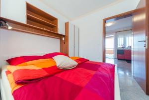 Postel nebo postele na pokoji v ubytování Apartments Hudic