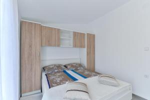 Posteľ alebo postele v izbe v ubytovaní Apartments Trk