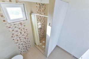 Kúpeľňa v ubytovaní Apartments Trk