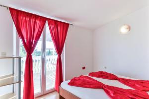 Posteľ alebo postele v izbe v ubytovaní Apartments Trk