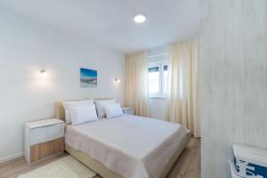 Postel nebo postele na pokoji v ubytování Apartment Martan