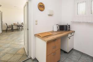 Kuchyňa alebo kuchynka v ubytovaní Apartments Napros