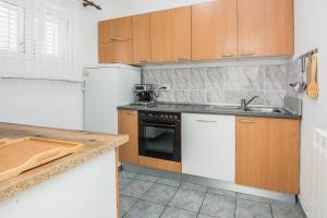 Kuchyňa alebo kuchynka v ubytovaní Apartments Napros