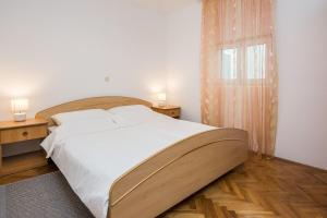 Posteľ alebo postele v izbe v ubytovaní Apartments Napros