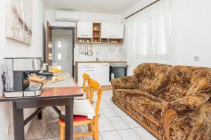 Kuchyňa alebo kuchynka v ubytovaní Apartments Napros