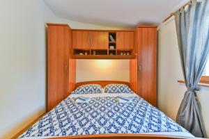 Postel nebo postele na pokoji v ubytování Apartment Druzinec