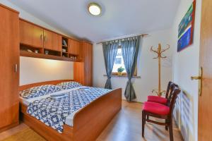 Postel nebo postele na pokoji v ubytování Apartment Druzinec
