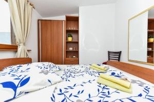 Postel nebo postele na pokoji v ubytování Apartment Druzinec