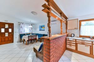 Kuchyň nebo kuchyňský kout v ubytování Apartment Druzinec