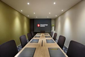 a conference room with a long table and chairs at Travelodge Myeongdong Euljiro in Seoul