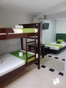 Postel nebo postele na pokoji v ubytování Hotel El Deportista