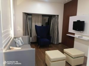 TV a/nebo společenská místnost v ubytování Orbett Hotel