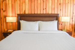 Gali's End By Roomy, Kalabagh Nathiagali客房内的一张或多张床位