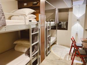 Postel nebo postele na pokoji v ubytování 拉開門輕旅 Le Passage Hostel