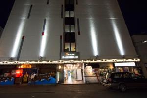 a building with a car parked in front of it at SEVEN Building / Vacation STAY 4948 in Asahikawa