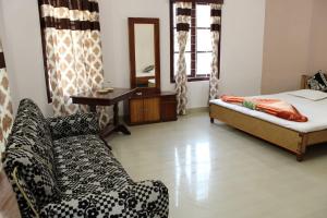 Postel nebo postele na pokoji v ubytování Green Reed Resort By Meenakshi, Kaziranga