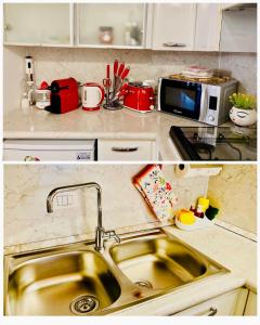 A kitchen or kitchenette at Central Apartment Private Parking Terrace & AC