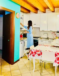A kitchen or kitchenette at Central Apartment Private Parking Terrace & AC