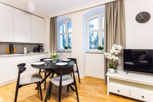 Kuchyňa alebo kuchynka v ubytovaní VacationClub – Wisus Apartament 4