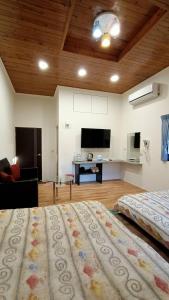 TV a/nebo společenská místnost v ubytování Xitou Tianpin Homestay + 37 fotografií