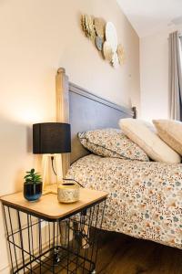 Krevet ili kreveti u jedinici u objektu Joli appartement, Le Bouchon Rémois, centre ville