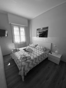 A bed or beds in a room at B&B Panorama Iseo