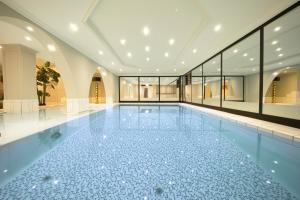 Bazén v ubytování Das Kronberg Hotel - Adults Only - inkl Soft- und Heißgetränkeflat nebo v jeho okolí