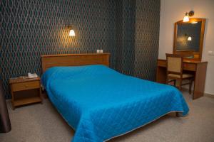 Postel nebo postele na pokoji v ubytování Hotel Liberty