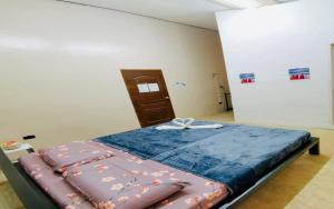 Postel nebo postele na pokoji v ubytování Big Paul Hostel