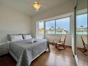 Una cama o camas en una habitación de Residenziale Fascino 2 Suítes by Achei Gramado