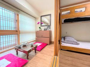 Postel nebo postele na pokoji v ubytování Cocoa Guesthouse