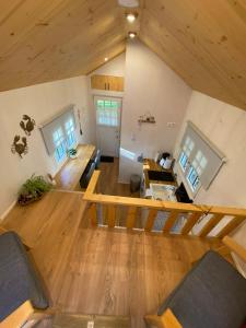 an overhead view of a living room and dining room at Tiny House Lippe im PIER9 Tiny House Hotel in Hamm