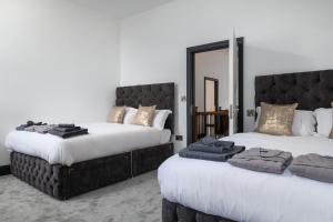 Säng eller sängar i ett rum på Finest Retreats - Capel Salem