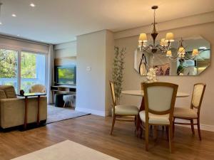 Χώρος καθιστικού στο Apartamentos Delle Alpi by Achei Gramado