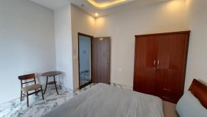 Postel nebo postele na pokoji v ubytování Uncle Park's Villa Son Trang 엉클팍