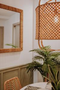 a dining room with a table and a mirror at Casa Los Yayos by Nomad Stays in Altea +35 photos