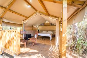 Postel nebo postele na pokoji v ubytování Camping Maremma Sans Souci