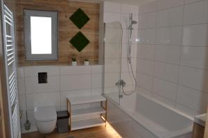 Koupelna v ubytování Bungalow + 35 fotografií