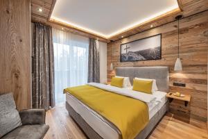 Łóżko lub łóżka w pokoju w obiekcie Apartment NH96 inklusive kostenfreiem Eintritt in die Alpentherme