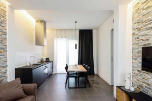 A kitchen or kitchenette at Acquarella Resort Suite