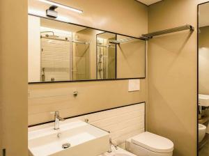 A bathroom at Acquarella Resort Suite